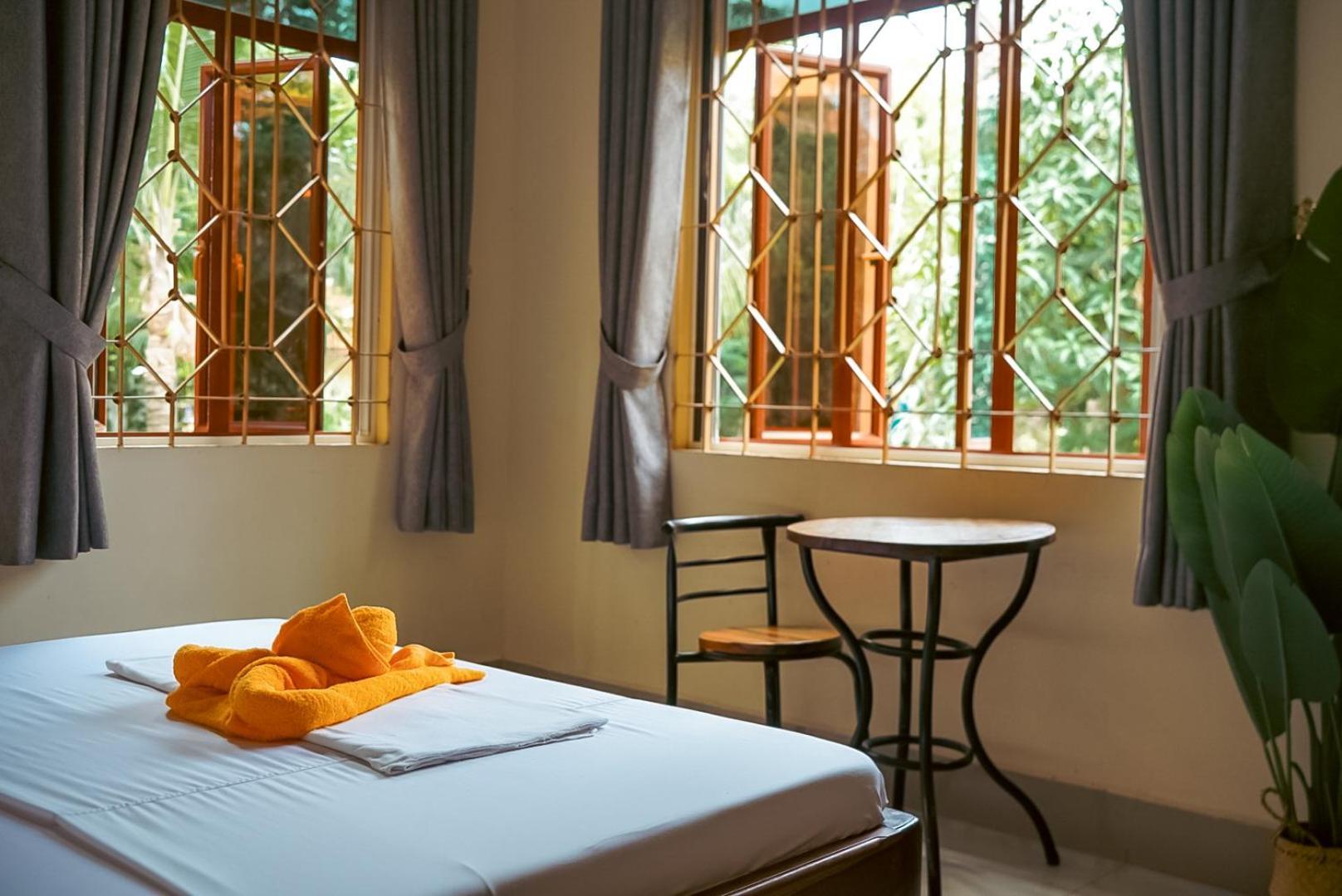 Karma Traders Kampot Hostel Bilik gambar